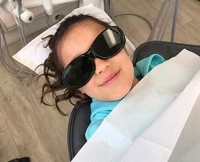 girl in dentist chair, kids dentist Millbrae, CA